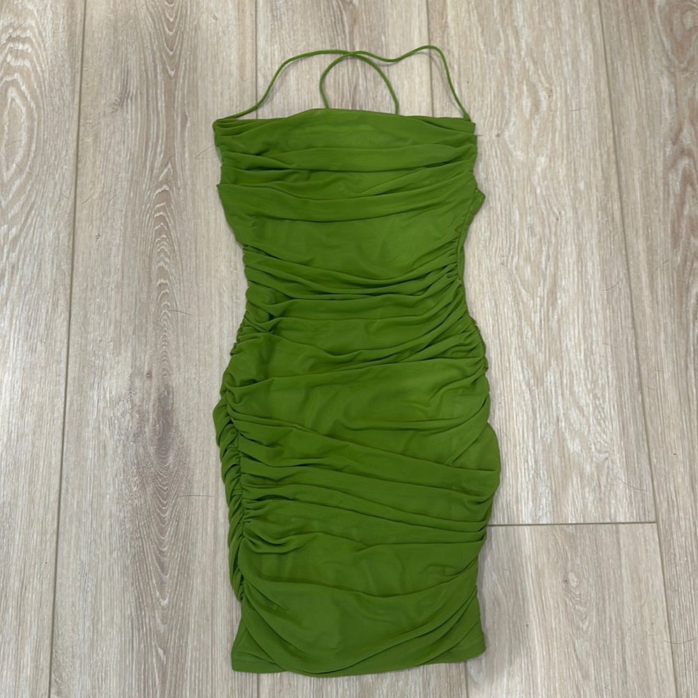 Crossed back green ruched bodycon dress